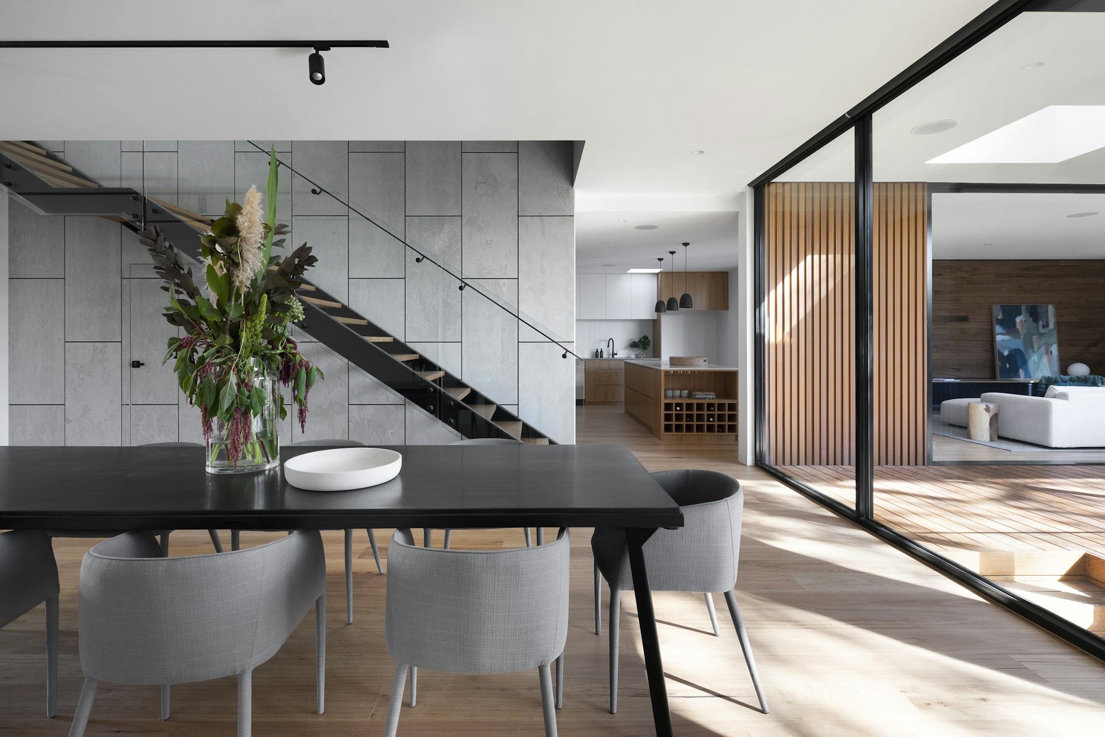 Light-filled living space with natural materials and refined architectural details